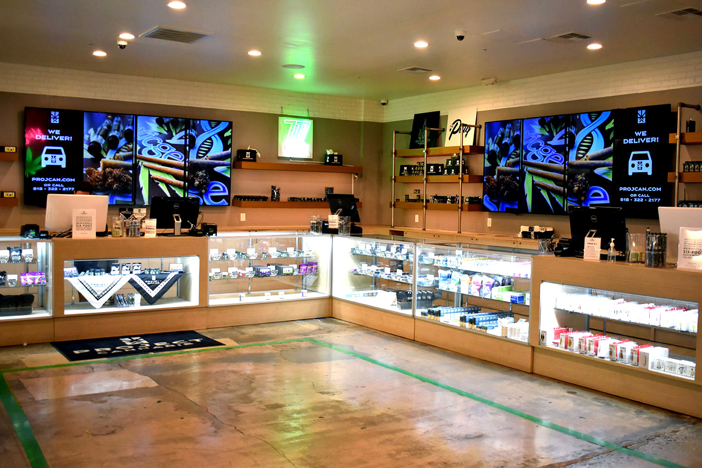 Project Cannabis NoHo store showing Divvy-powered digital screens reinforcing partner merchandising at the point of purchase.