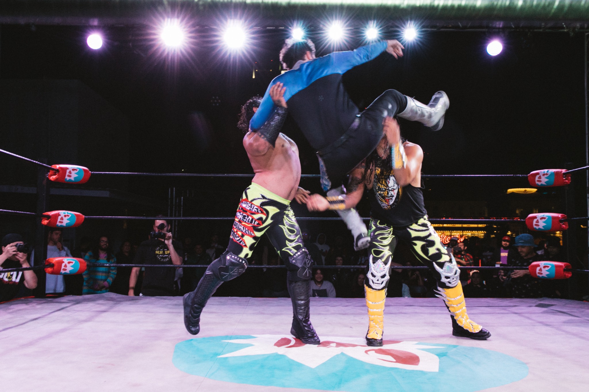 Wrestlers facing off at Mota Mania. Photo: Hazy.